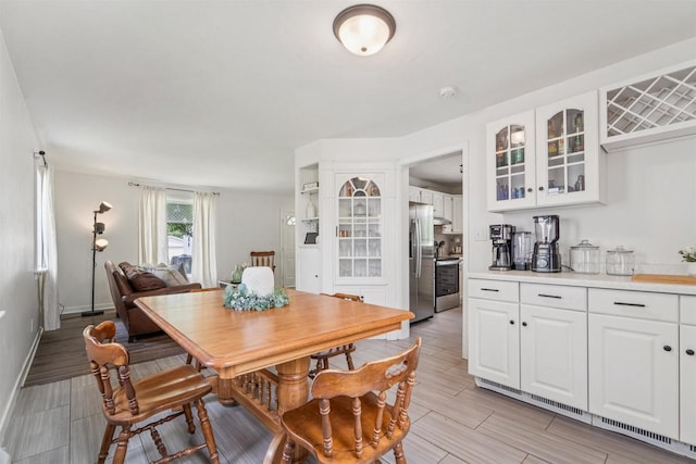 266 E 10th St, Fond Du Lac, WI 54935 - dining area with wood tiled floors