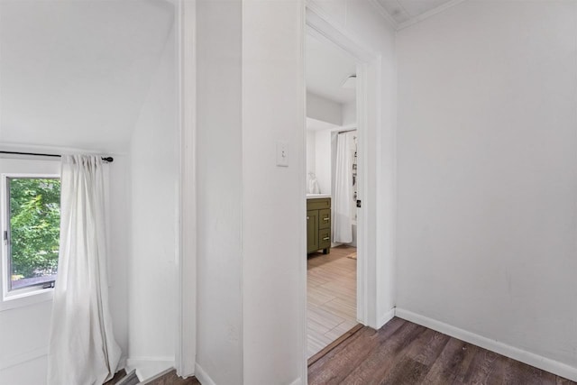 266 E 10th St, Fond Du Lac, WI 54935 - corridor featuring dark wood-type flooring and baseboards