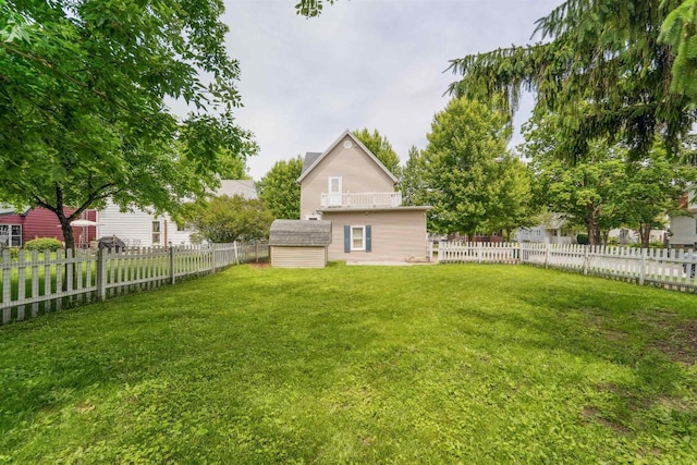 266 E 10th St, Fond Du Lac, WI 54935 - fenced backyard featuring a shed