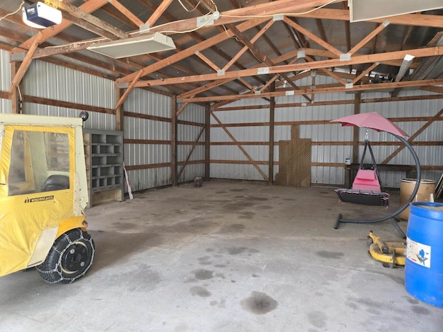 8519 Pigeon Lake Rd, Valders, WI 54245 - garage with a garage door opener and metal wall
