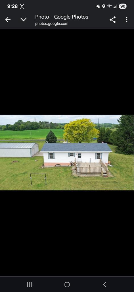8519 Pigeon Lake Rd, Valders, WI 54245 - view of home's community with a lawn and a wooden deck