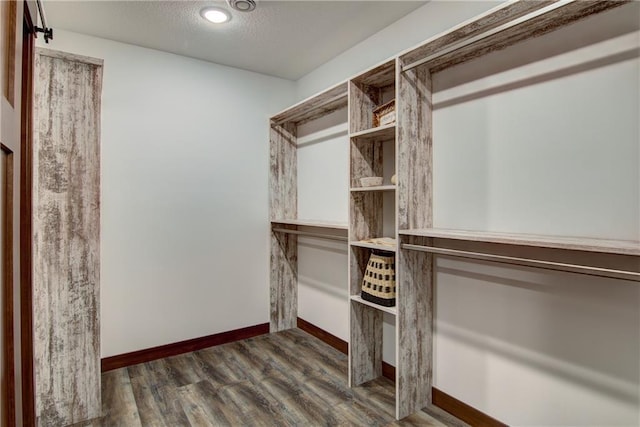 1724 Dorret Rd, Eau Claire, WI 54703 - walk in closet featuring wood finished floors