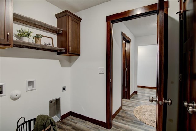 1724 Dorret Rd, Eau Claire, WI 54703 - laundry room with electric dryer hookup, cabinet space, hookup for a washing machine, and wood finished floors