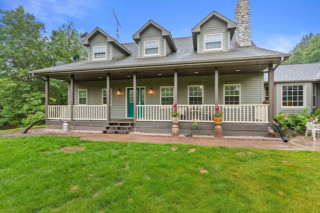 704 Sandy Pines Ct, Redgranite, WI 54970 - view of front facade with a front yard, covered porch, and a chimney