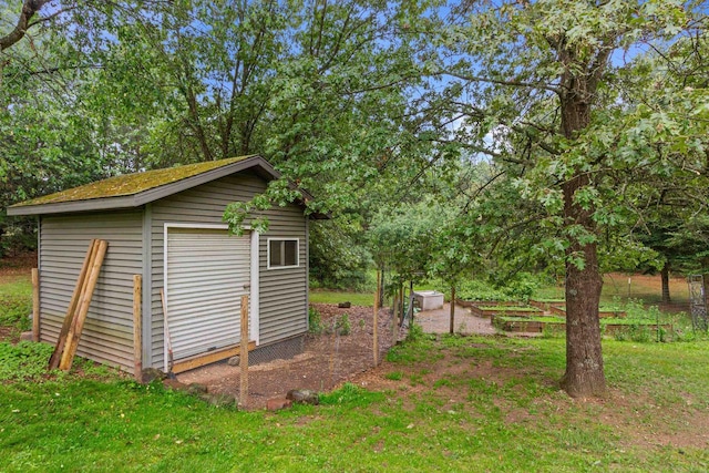 704 Sandy Pines Ct, Redgranite, WI 54970 - view of shed with a garden