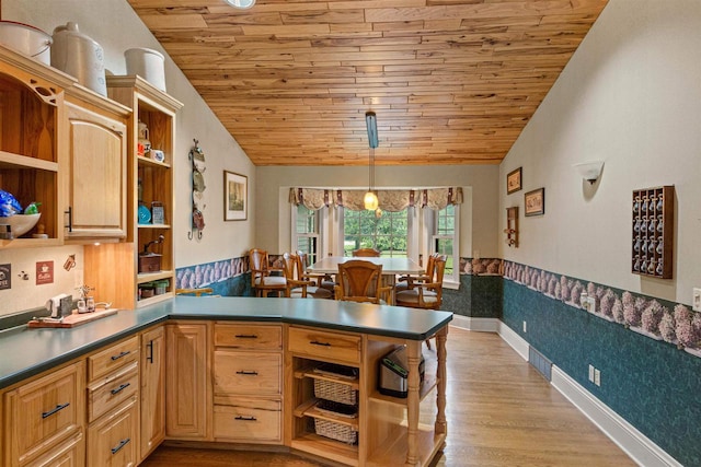 704 Sandy Pines Ct, Redgranite, WI 54970 - kitchen featuring open shelves, wood ceiling, lofted ceiling, a peninsula, and hanging light fixtures