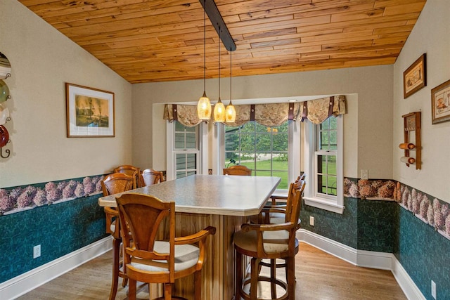 704 Sandy Pines Ct, Redgranite, WI 54970 - dining area featuring wood ceiling, light wood-style flooring, and vaulted ceiling