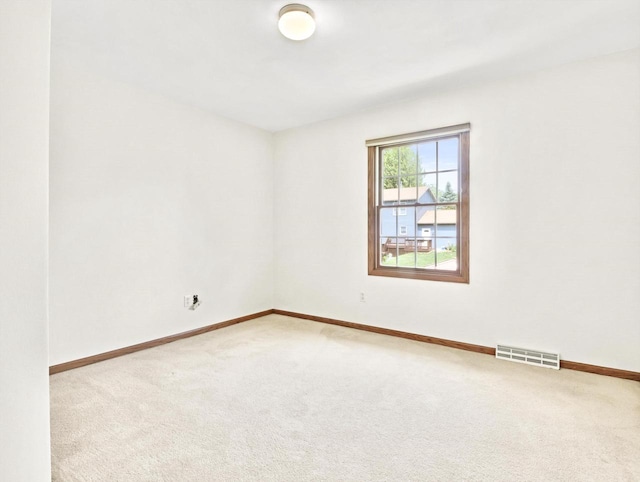 4315 Tanglewood Dr, Janesville, WI 53546 - carpeted empty room featuring baseboards