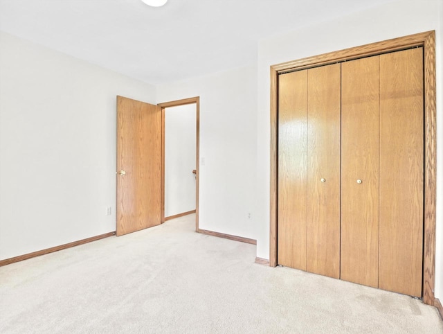 4315 Tanglewood Dr, Janesville, WI 53546 - unfurnished bedroom featuring light colored carpet and a closet