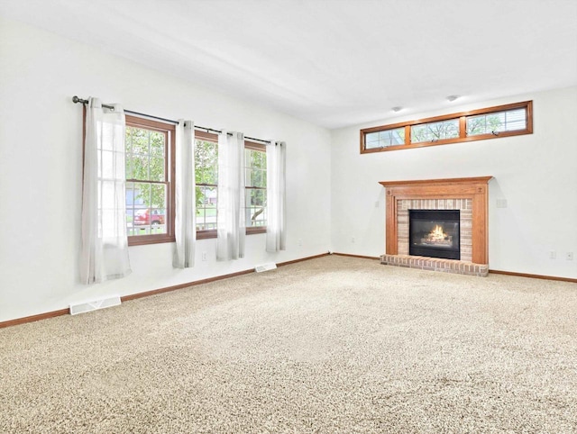 4315 Tanglewood Dr, Janesville, WI 53546 - unfurnished living room with a brick fireplace and carpet