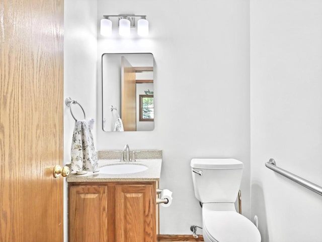 4315 Tanglewood Dr, Janesville, WI 53546 - half bathroom featuring vanity and toilet