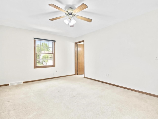 4315 Tanglewood Dr, Janesville, WI 53546 - empty room with light colored carpet and a ceiling fan
