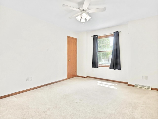 4315 Tanglewood Dr, Janesville, WI 53546 - carpeted empty room featuring a ceiling fan and baseboards