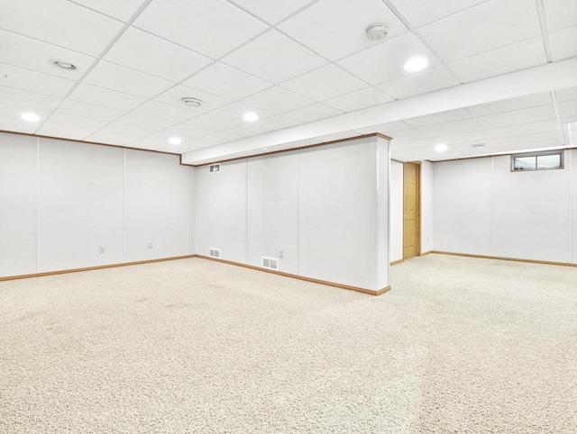 4315 Tanglewood Dr, Janesville, WI 53546 - finished basement featuring a paneled ceiling, carpet floors, and recessed lighting