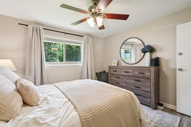 235 Jasper Ln, Waukesha, WI 53188 - bedroom with wood finished floors and ceiling fan
