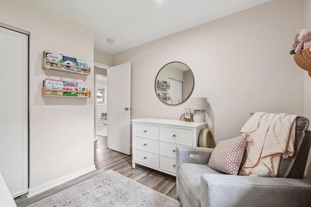 235 Jasper Ln, Waukesha, WI 53188 - sitting room with wood finished floors and baseboards