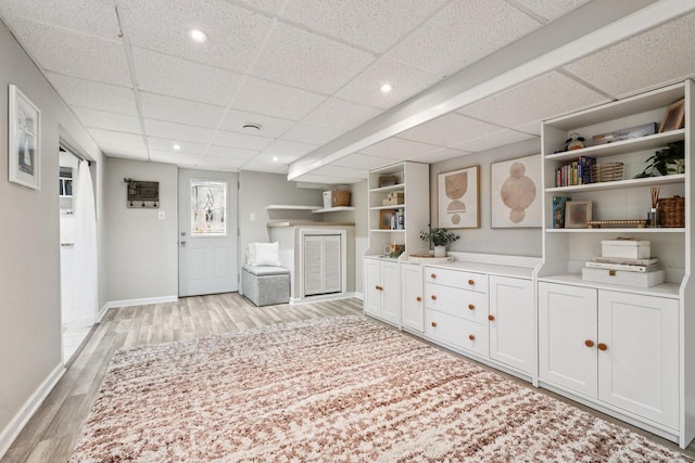 235 Jasper Ln, Waukesha, WI 53188 - hallway featuring light wood-type flooring, recessed lighting, and a paneled ceiling