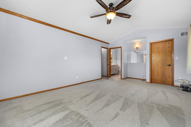 8206 41st Ave, Kenosha, WI 53142 - unfurnished bedroom featuring vaulted ceiling, carpet, crown molding, ensuite bath, and ceiling fan