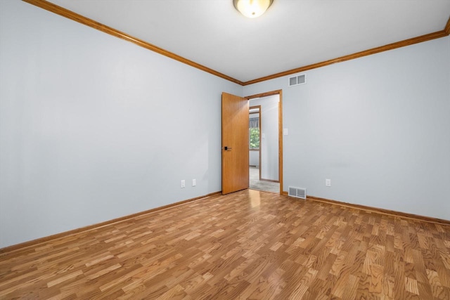 8206 41st Ave, Kenosha, WI 53142 - unfurnished room with ornamental molding and light wood-style flooring