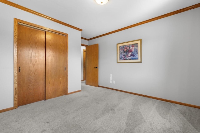 8206 41st Ave, Kenosha, WI 53142 - unfurnished bedroom with carpet floors, a closet, and crown molding