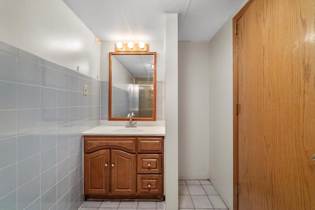 8206 41st Ave, Kenosha, WI 53142 - bathroom with vanity, tile patterned floors, and tile walls