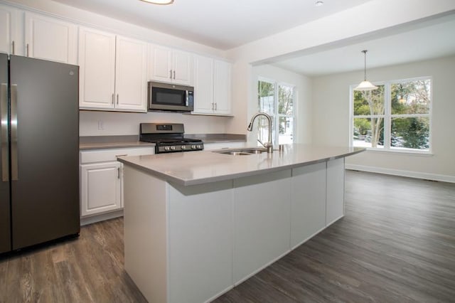 415 Kensington Ct Unit Lt128Adams, Williams Bay, WI 53191 - kitchen featuring stainless steel appliances, dark wood-style floors, healthy amount of natural light, and white cabinetry
