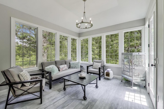 9335 223rd Ave, Salem, WI 53168 - sunroom featuring a chandelier, an outdoor hangout area, and plenty of natural light