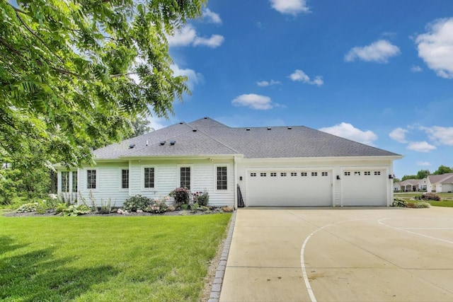 9335 223rd Ave, Salem, WI 53168 - view of front of property featuring a garage, concrete driveway, a front yard, and roof with shingles