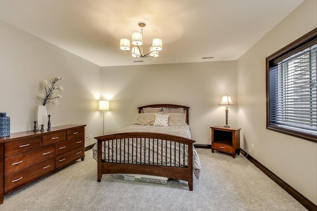 9335 223rd Ave, Salem, WI 53168 - bedroom featuring light colored carpet and a chandelier