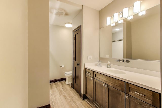 9335 223rd Ave, Salem, WI 53168 - bathroom with vanity and wood finished floors