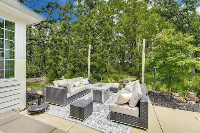 9335 223rd Ave, Salem, WI 53168 - view of patio / terrace with an outdoor living space and view of wooded area