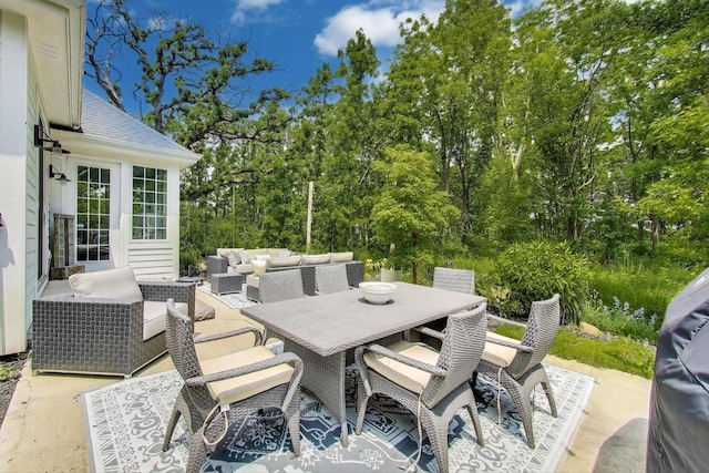 9335 223rd Ave, Salem, WI 53168 - view of patio / terrace with an outdoor living space, outdoor dining area, and view of scattered trees