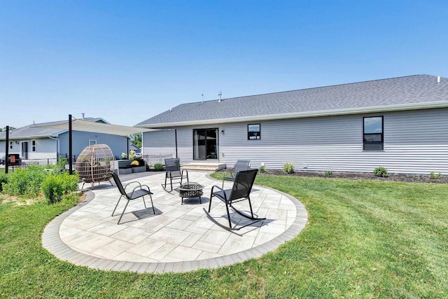 582 Clay St, Wrightstown, WI 54180 - rear view of house featuring a fire pit, a patio area, and a yard