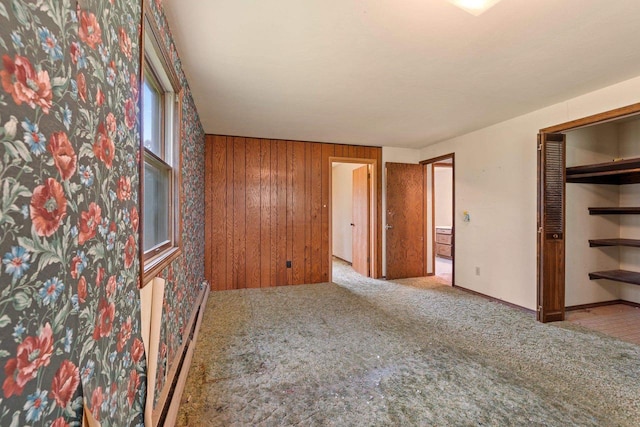 1490 Fernando Dr, Ashwaubenon, WI 54115 - unfurnished bedroom featuring carpet floors and wooden walls