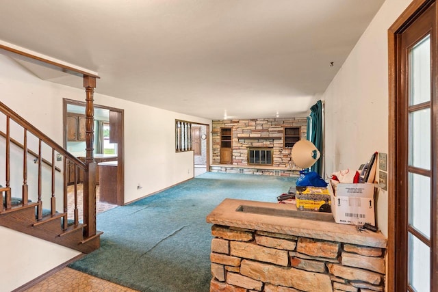 1490 Fernando Dr, Ashwaubenon, WI 54115 - carpeted living area featuring a fireplace and stairway