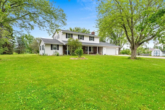 1490 Fernando Dr, Ashwaubenon, WI 54115 - traditional-style house featuring a garage, a front lawn, driveway, and a storage shed