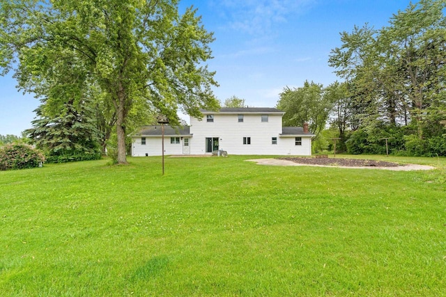 1490 Fernando Dr, Ashwaubenon, WI 54115 - back of house with a lawn