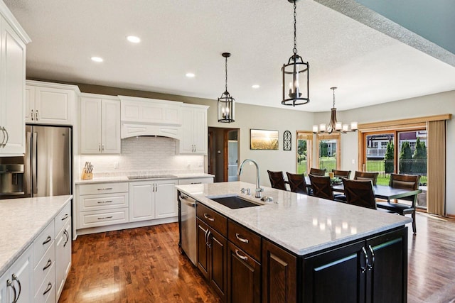 13745 W Park Central Blvd, New Berlin, WI 53151 - kitchen with recessed lighting, appliances with stainless steel finishes, white cabinets, decorative backsplash, and dark wood-type flooring