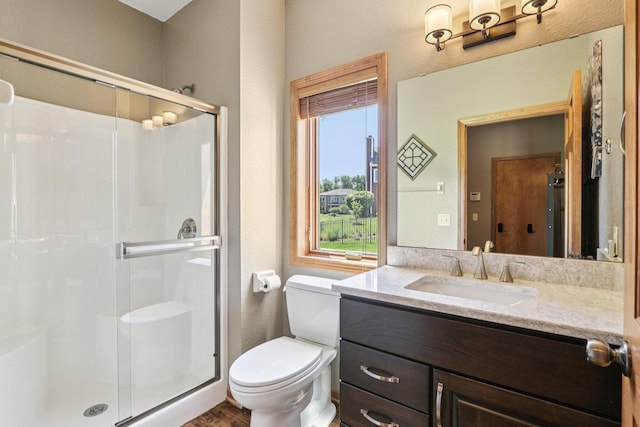 13745 W Park Central Blvd, New Berlin, WI 53151 - full bath with a stall shower, vanity, and wood finished floors
