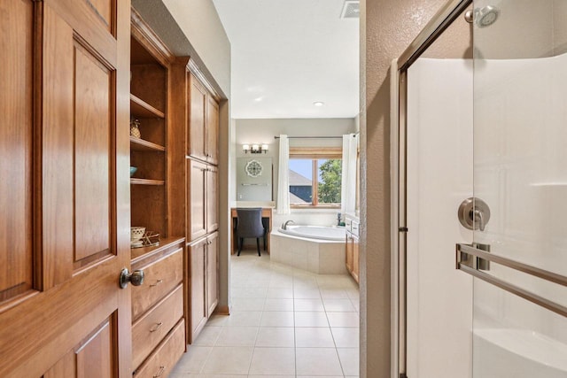 13745 W Park Central Blvd, New Berlin, WI 53151 - full bathroom with tile patterned flooring, a stall shower, and a garden tub