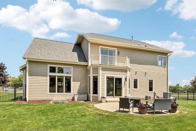 13745 W Park Central Blvd, New Berlin, WI 53151 - back of property with a balcony, a fenced backyard, a patio area, and a shingled roof