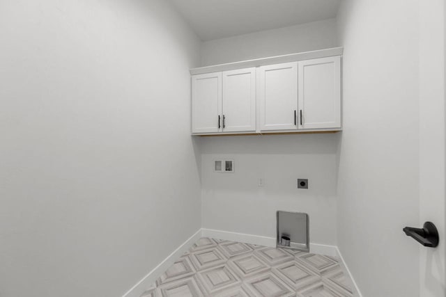 2061 White Dove Ln, Kaukauna, WI 54130 - laundry room featuring hookup for an electric dryer, cabinet space, washer hookup, and light flooring