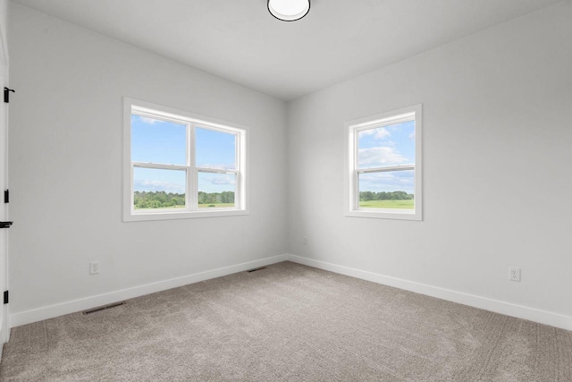 2061 White Dove Ln, Kaukauna, WI 54130 - carpeted empty room featuring baseboards