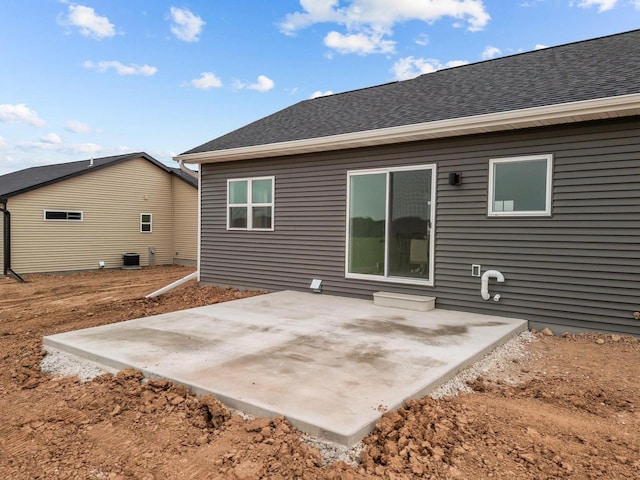 2061 White Dove Ln, Kaukauna, WI 54130 - rear view of house with a patio and roof with shingles