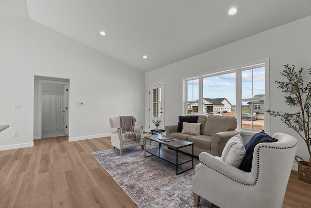 2061 White Dove Ln, Kaukauna, WI 54130 - living area featuring high vaulted ceiling, light wood-style floors, and recessed lighting