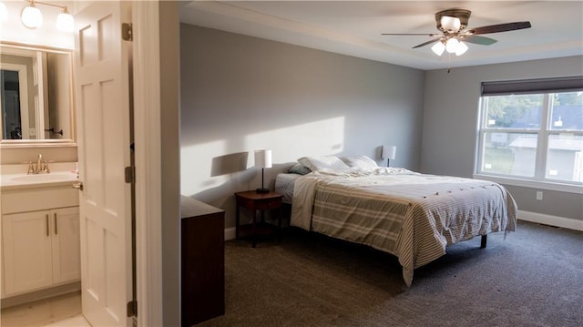 406 S Birch St, Marshfield, WI 54449 - bedroom featuring light colored carpet, ensuite bath, and ceiling fan