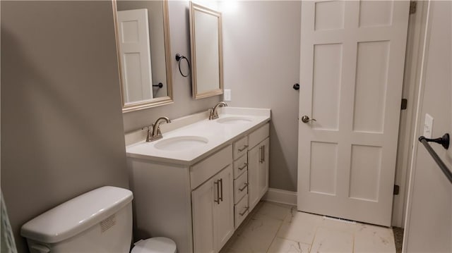 406 S Birch St, Marshfield, WI 54449 - bathroom with marble finish floors and double vanity