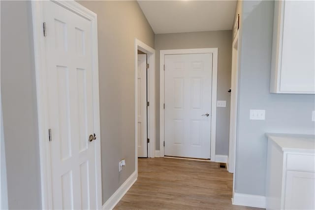 406 S Birch St, Marshfield, WI 54449 - hallway with baseboards and light wood finished floors