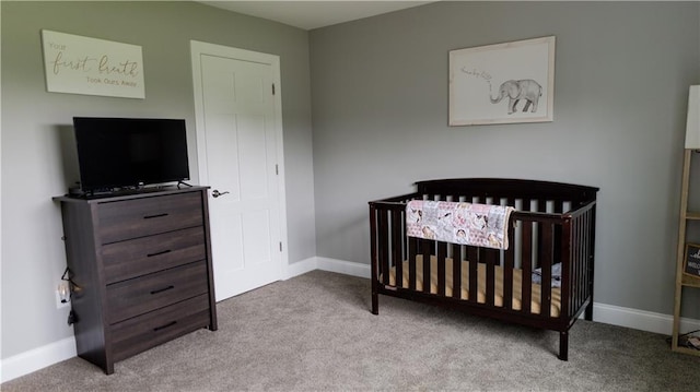 406 S Birch St, Marshfield, WI 54449 - carpeted bedroom featuring a nursery area and baseboards