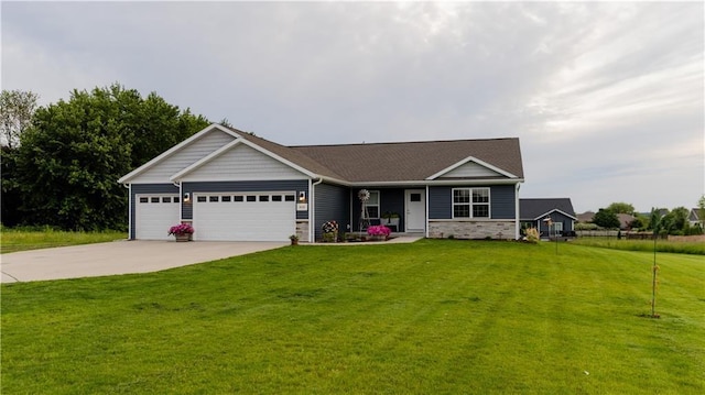 406 S Birch St, Marshfield, WI 54449 - single story home with a garage, a front yard, driveway, and stone siding